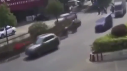 Car gets crushed between 2 cement trucks