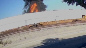 Plane crashes into warehouse in California