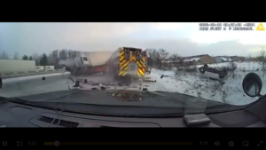 Truck smashes into emergency vehicles