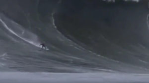 Awesome Video shows Man Surfing the Largest Wave in the World