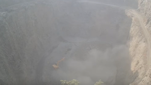 Watch the Truck Loaded with Stones at the Top of the Quarry