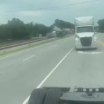 train collides with truck