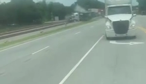 train collides with truck