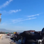 Biker crashes into a car