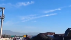 Biker crashes into a car