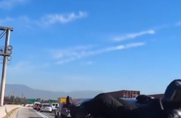 Biker crashes into a car