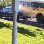 Distracted driver slams into school bus