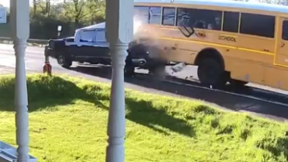 Distracted driver slams into school bus